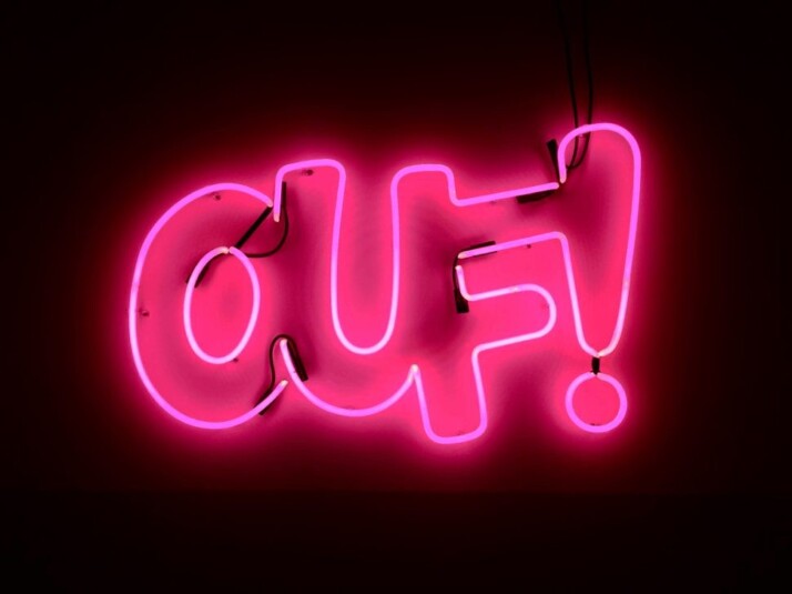 ouf light signage with exclamation point at the end