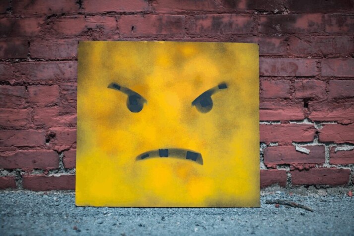 A yellow block with an angry face drawn over it.