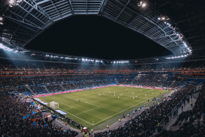 A view of the whole football stadium with crowds.