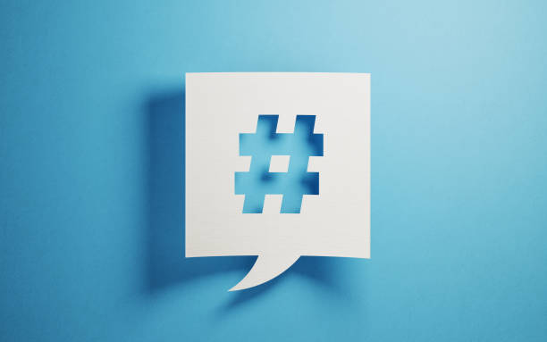 picture of hashtag on white chat bubble on blue background