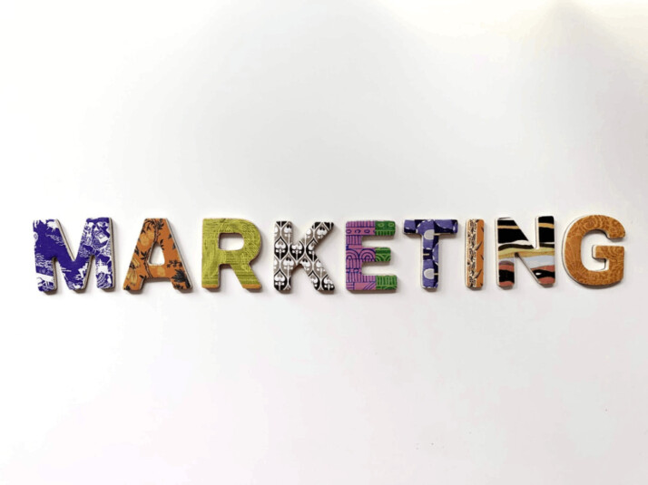 multicolored marketing freestanding letters placed on a white background. 