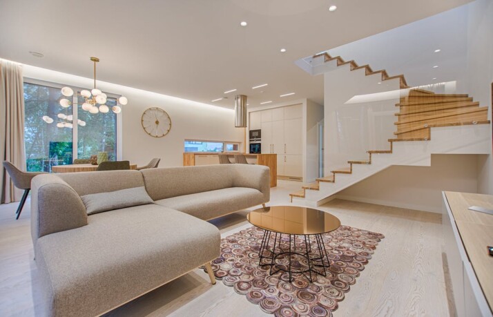 inside view of a house with couch and dinner table