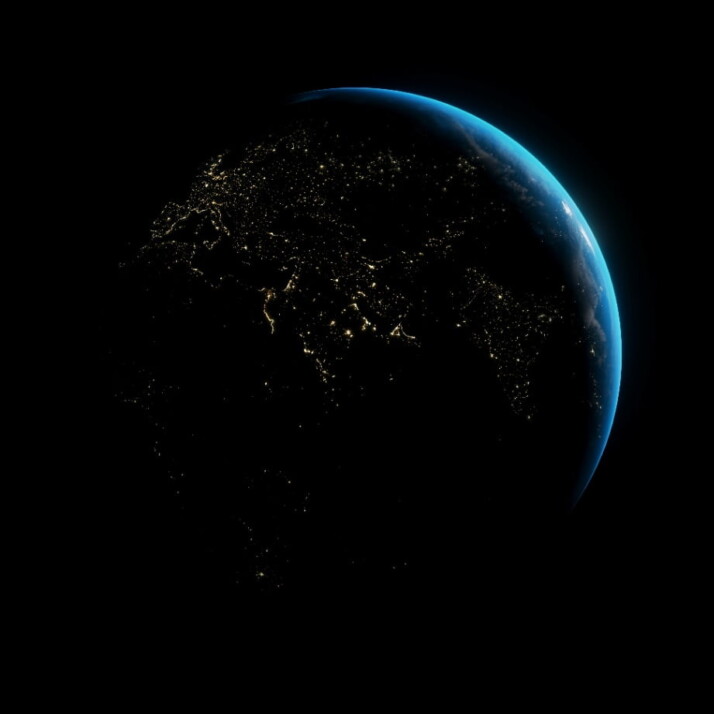 photo of Earth at night over asia, europe and africa visible.