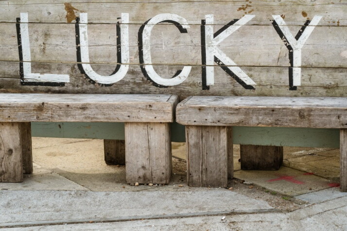 A pair of benches with the word 