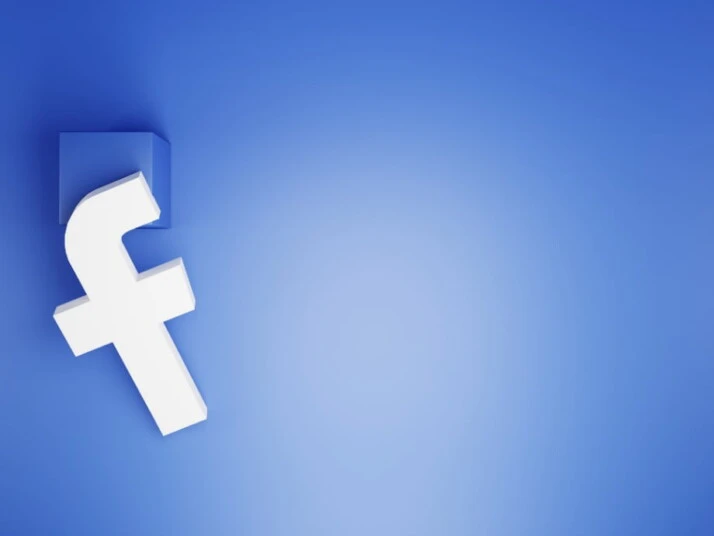 An animation of the Facebook logo f with a blue background.