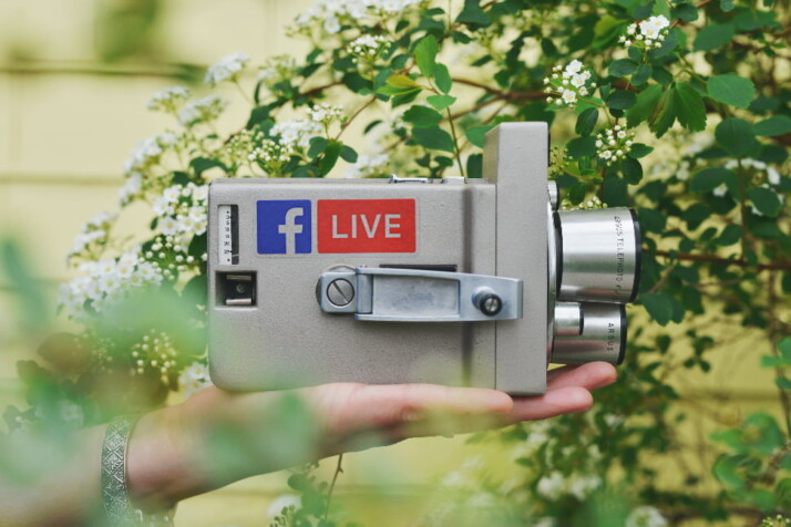 A video camera with a Facebook and Live logo.
