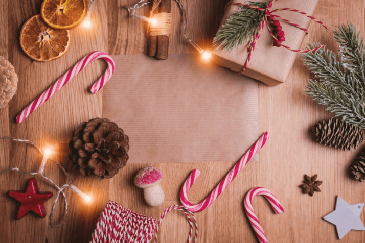 An assorted Christmas ornaments and gifts on the floor