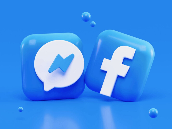 3d blue symbols of Facebook and Messenger in front of a blue background.