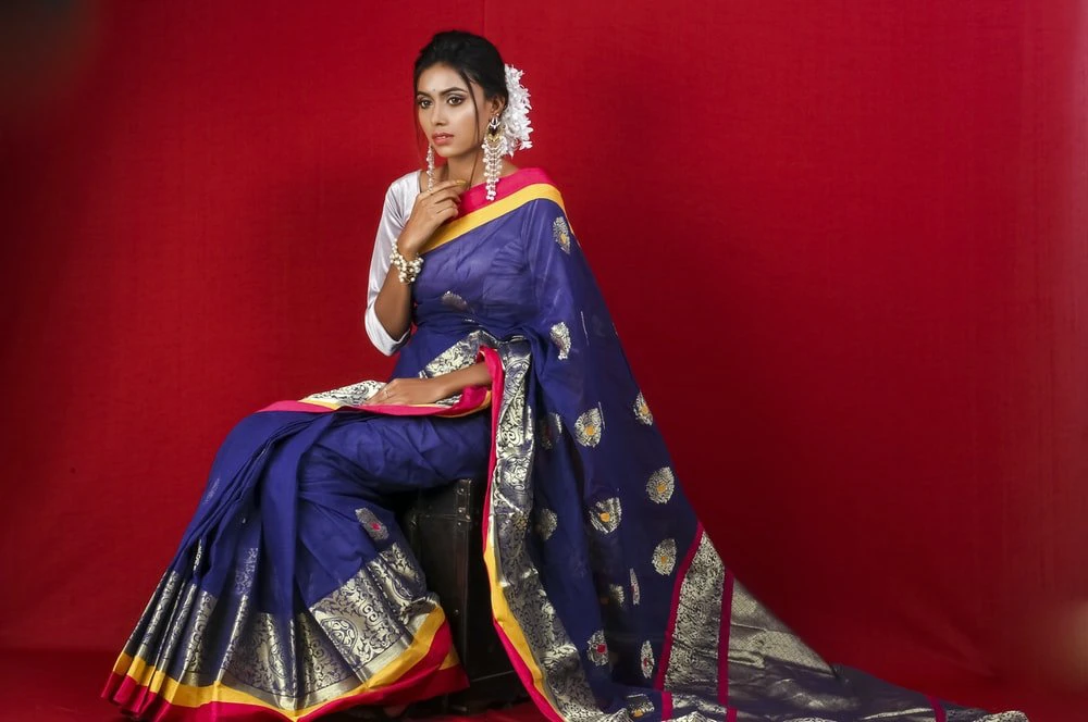 woman in blue and yellow sari dress