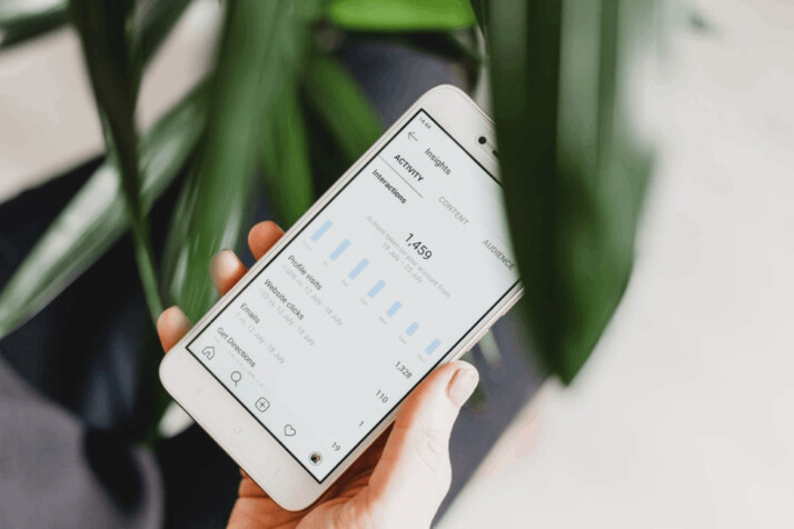 A person looking at Facebook Insights on an Android smartphone