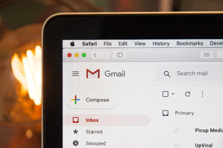 photo of a macbook which has gmail displaying on a tab.