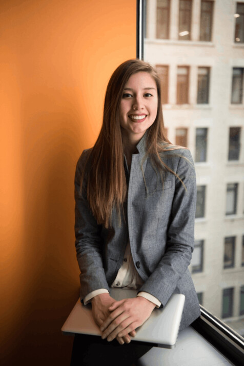 Shallow focus photo of woman in gray jacket application for job