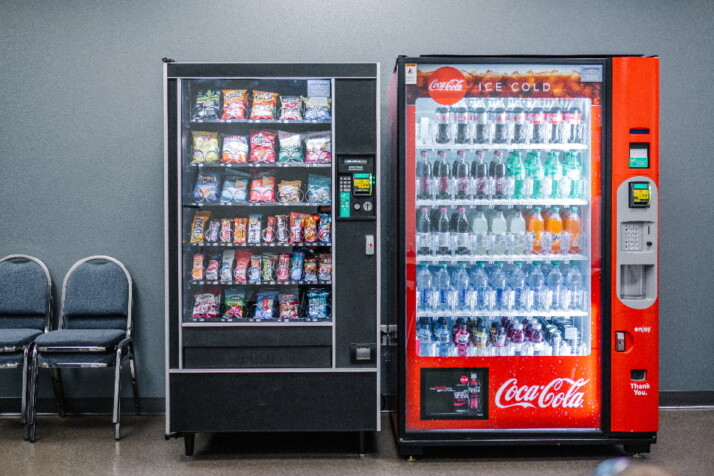 Two vending machines that are placed side by side.