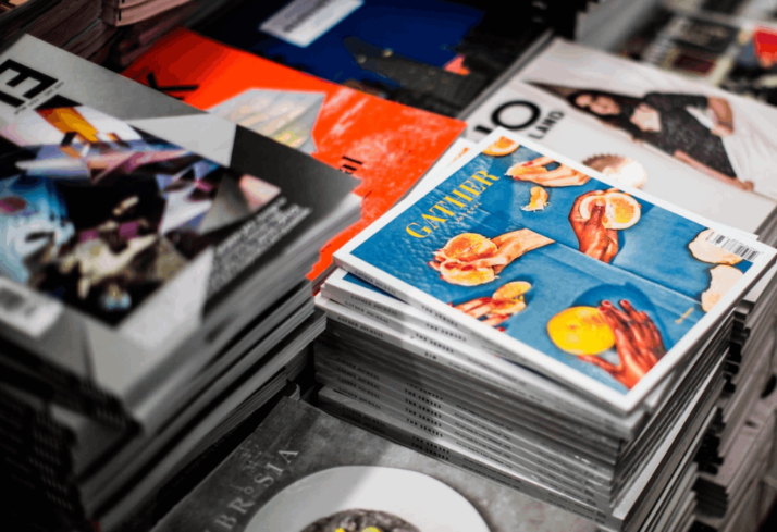 A colorful assorted-title magazine lot placed on a table.