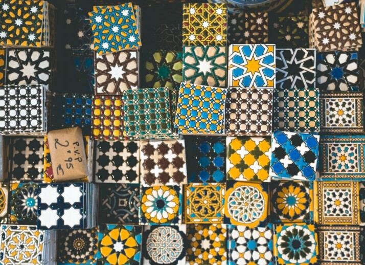 A wide array of colorful and patterned ceramic tiles.