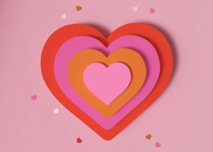 A big heart made up of layers of heart cut-outs.