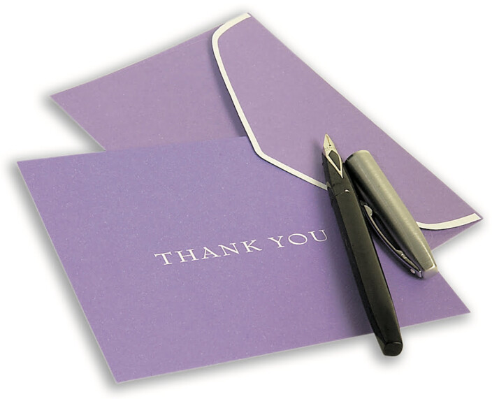 black pen on purple thank you hand card and envelop