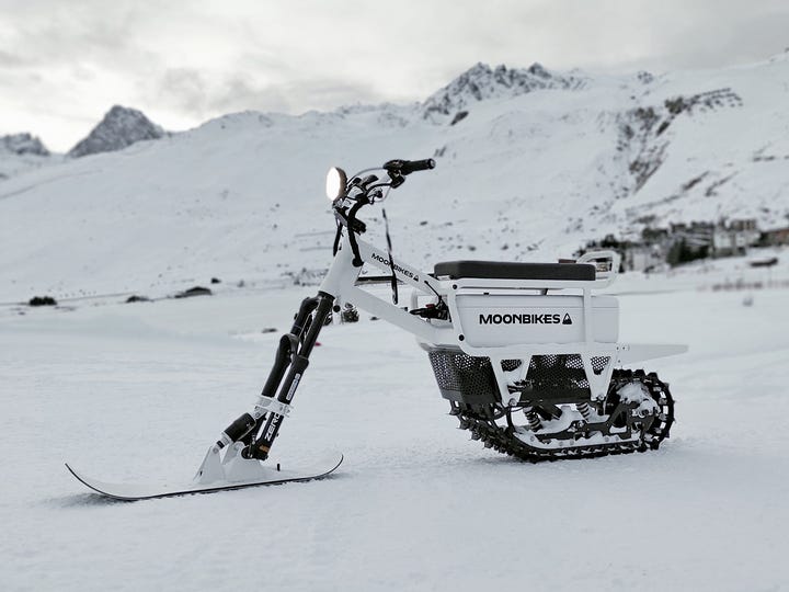 The MoonBike Motors fully electric snowbike on a snowy terrain — wildest CES 2022 products