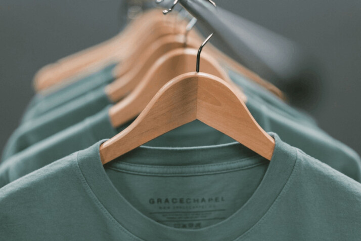 selective focus photography of green crew-neck shirt