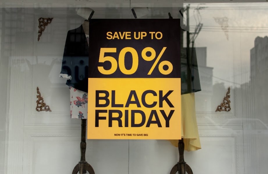 A black and yellow poster of 50% Black Friday Sale offer