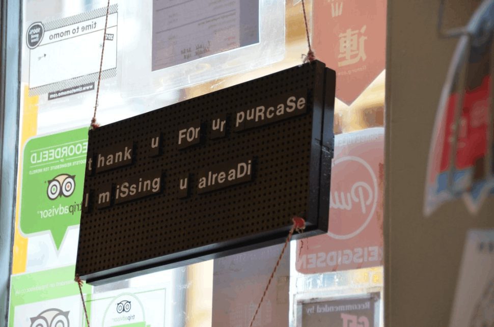 A text in a store that is written in broken English.