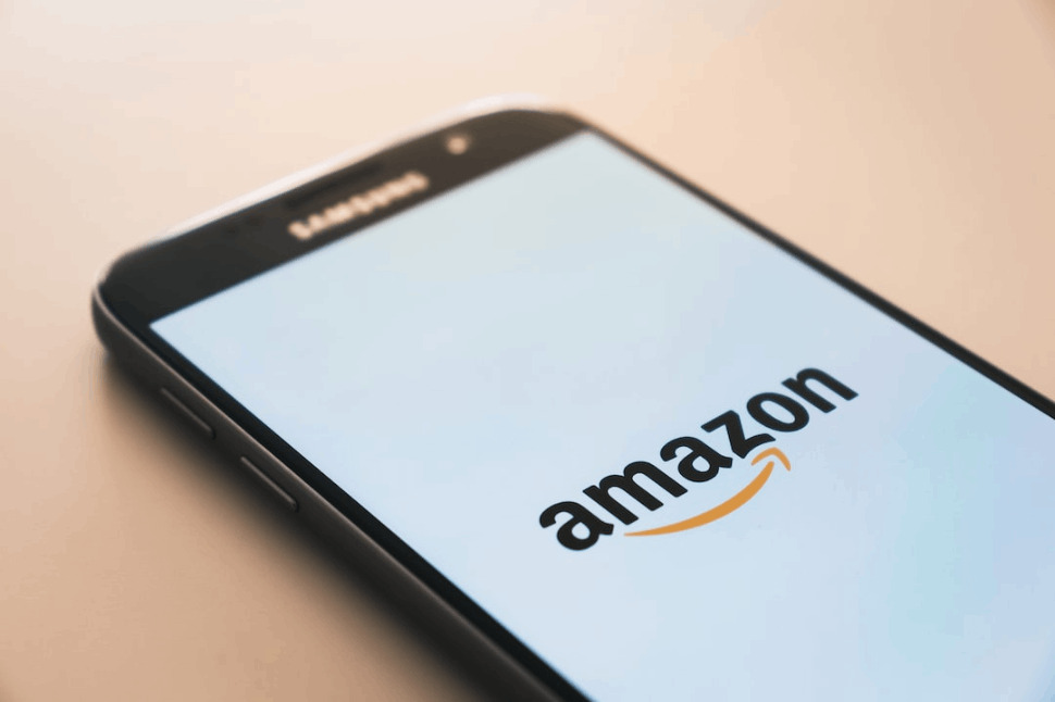 A black Samsung Galaxy smartphone displaying the Amazon logo