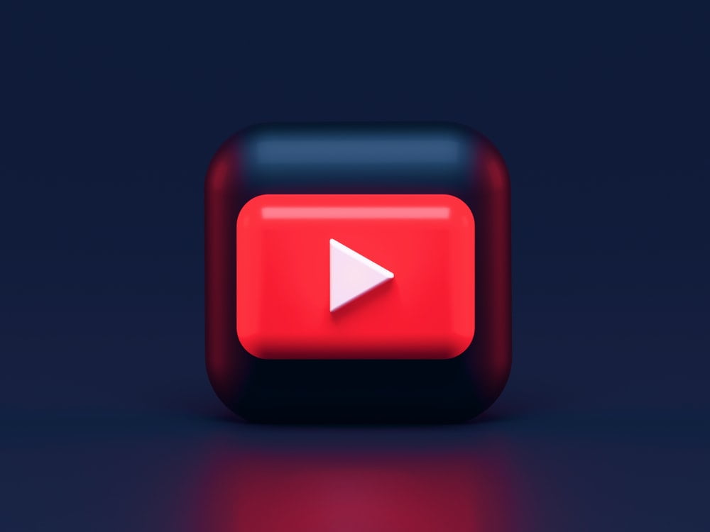 A vector image of the YouTube logo with a blue background.
