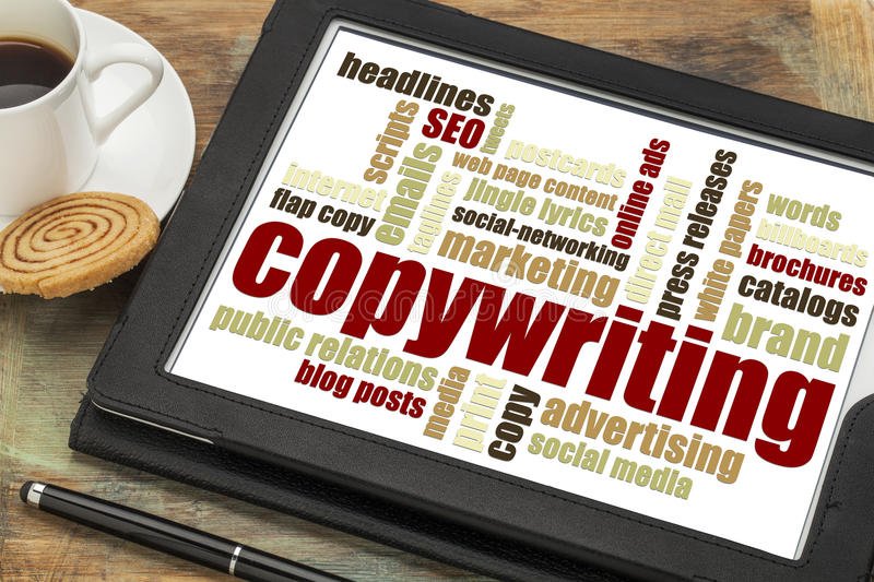 copywriting word cloud tablet on table near coffee cup