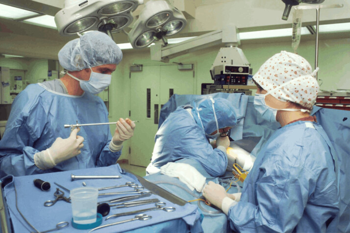 Doctors and nurses in blue scrub suit working together