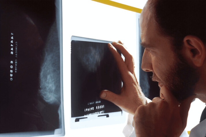 person holding black tablet computer