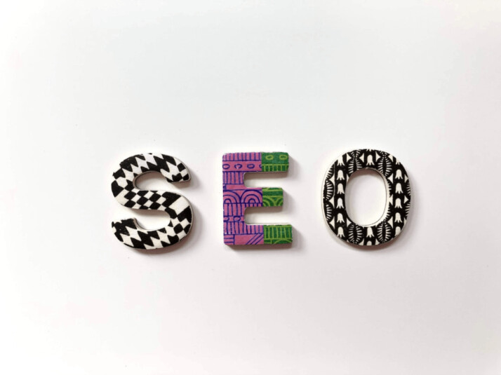 A multicolored and grayscale patterned SEO blocks on a white background
