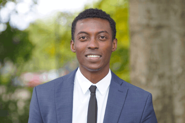 man in grey and white suit