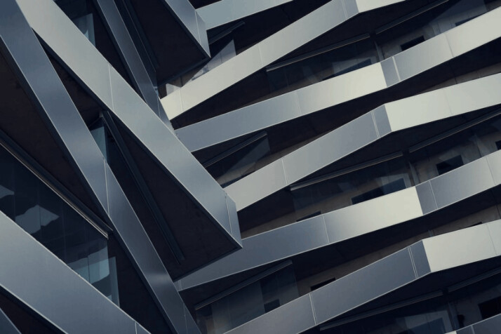 low angle photography of gray building at daytime. architecture