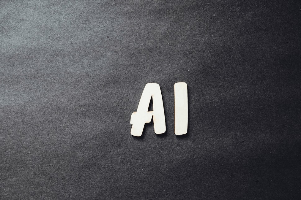 Image of the word AI with grey background
