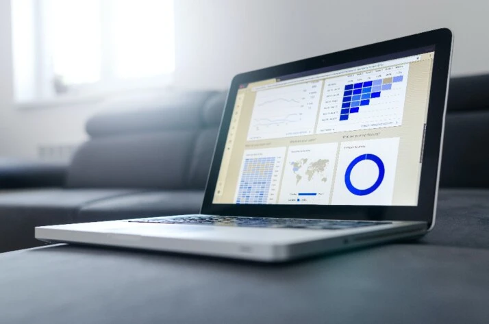 A laptop displaying a set of analytical data on its screen.