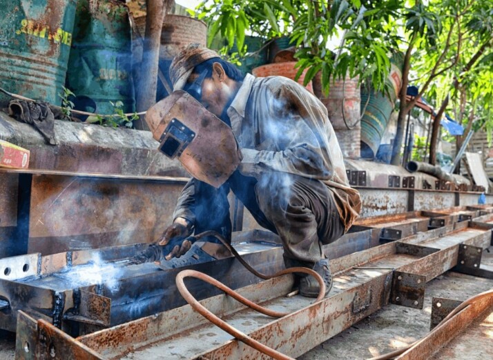 Man using welding machine