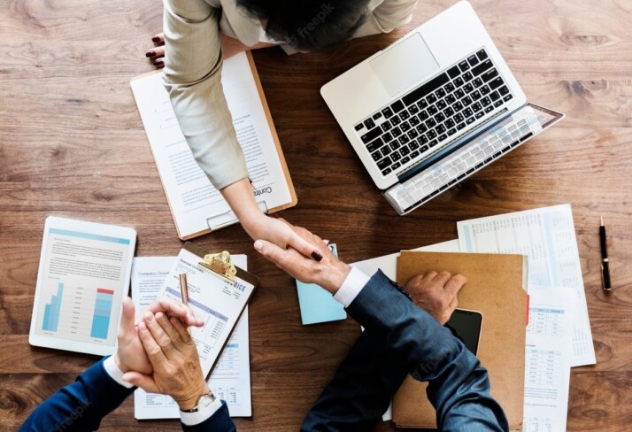 Shaking hands on business meeting