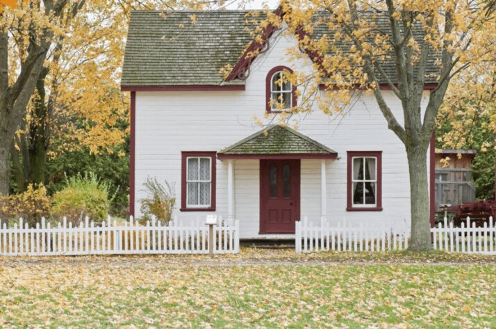 White house under maple trees